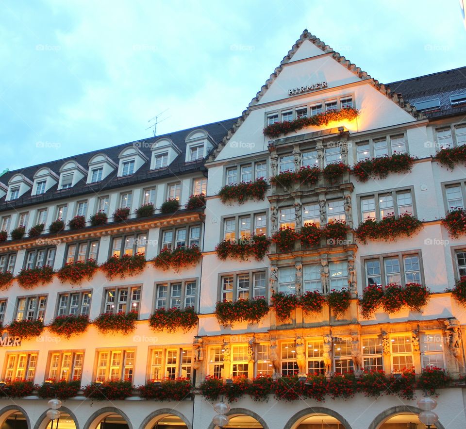 Hotel windows. Windows and flowers of a popular hotel in Marienplatz Munich, Germany.