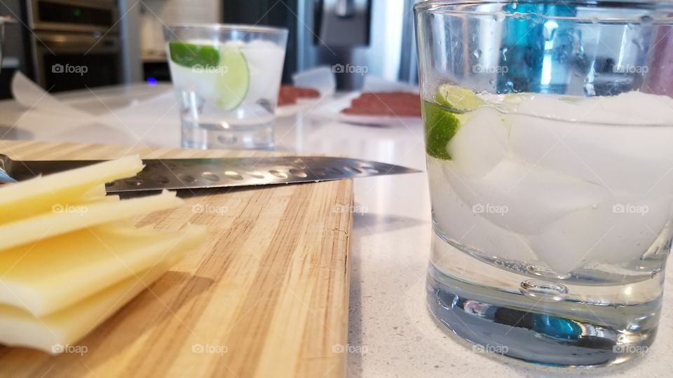 mealtime prep, with gin and tonic handy