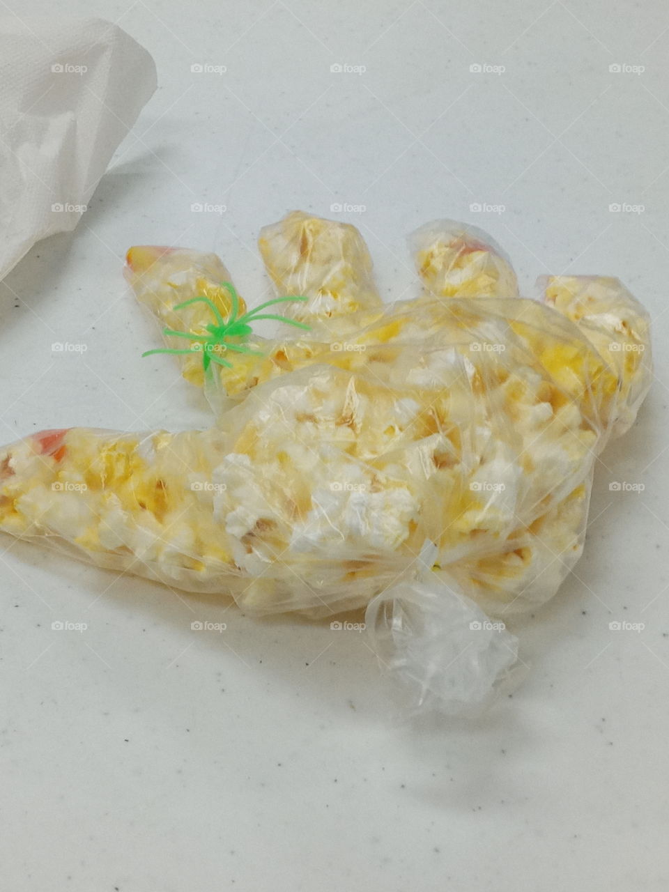 popcorn hand with a spider ring how creative is that? seniors are being kids again.