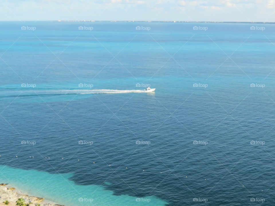 Boat on ocean in Cancun.