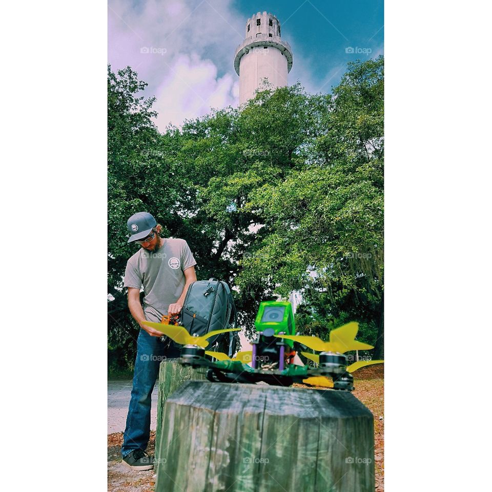FPV Drone flying at the River Tower Park in Tampa Florida. A yound man readies his gear - fat shark goggles, skeptrum D6 radio, charpu qavx quad all kept in his Lowepro backpack. The tower is his giant to dive today, he will conquer the skies. Like Icarus he may fly too close to the sky. This is Multirotor Misfit magic at its finest ♡ 

Instagram: @siren.fpv
www.jrosephotog.com