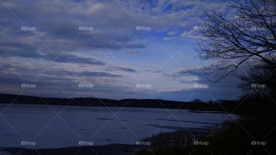 Clouds over scenic lake