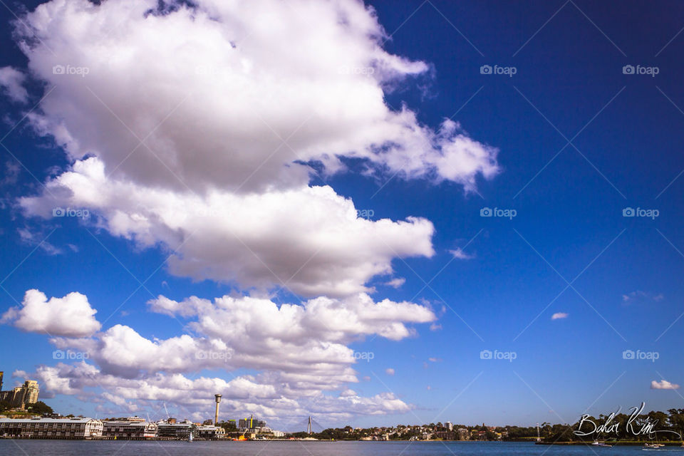 sky blue clouds view by laconic