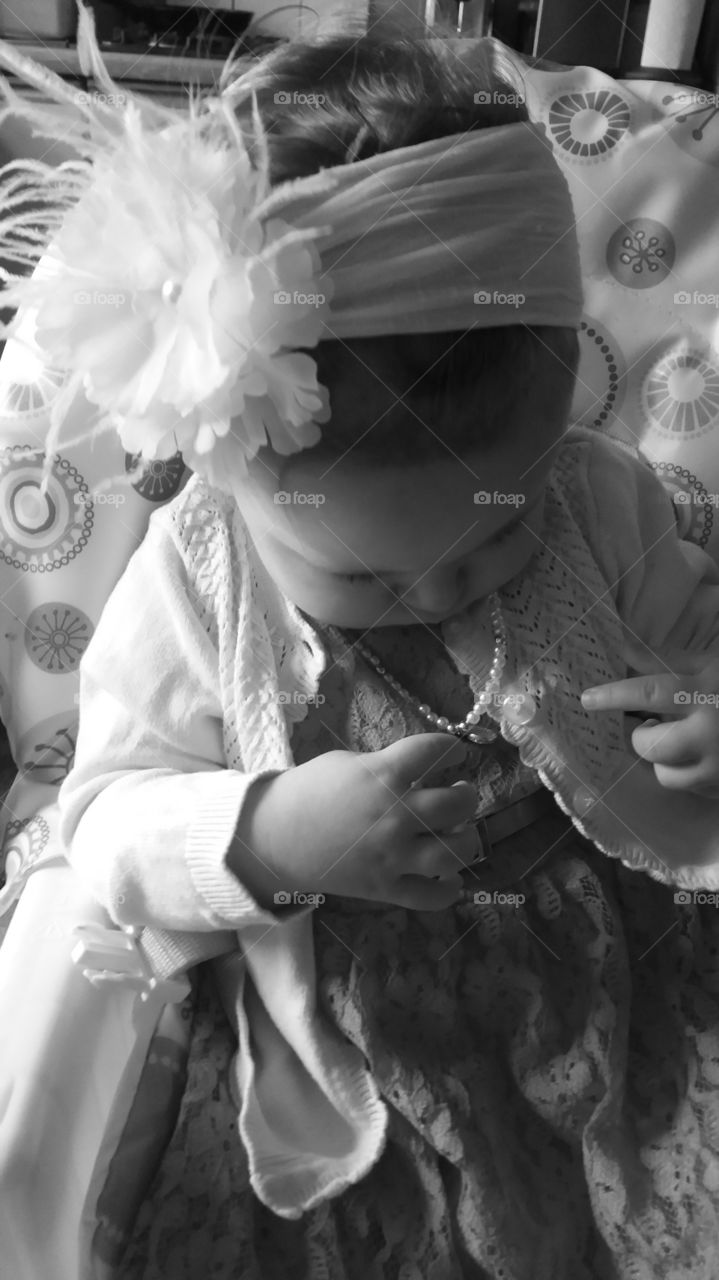 Close-up of a cute little girl wearing hairband