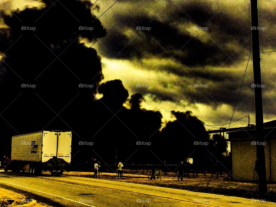 Smoke rising from the flames