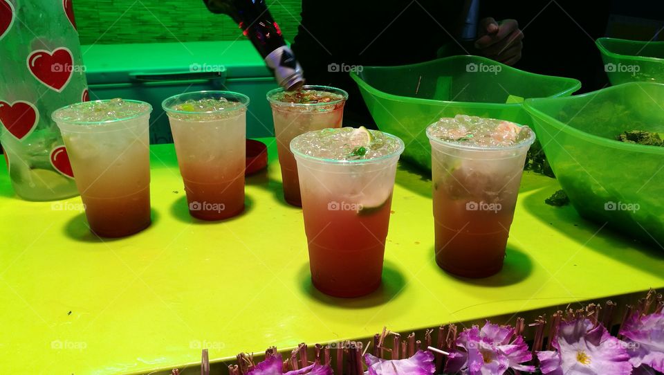 preparing cocktail in outdoor pary