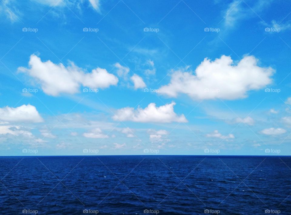 Cloud scape on the sea, the beauty of cumulus clouds combined with the softness of cirrus clouds.