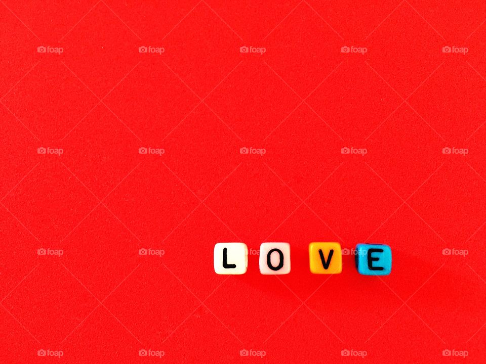 Love on red background 