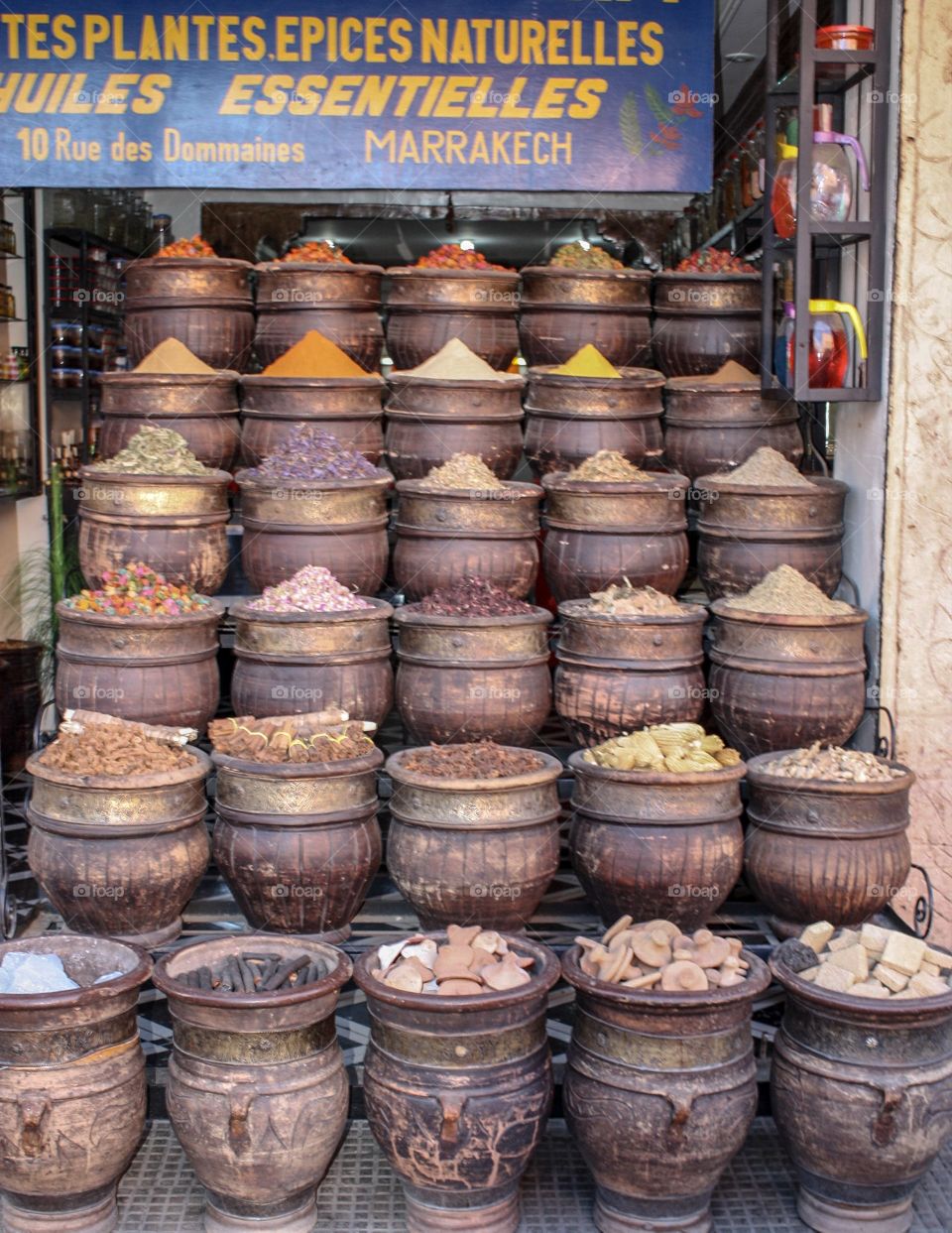 Spices lined up in a market stall in Marrakesh
