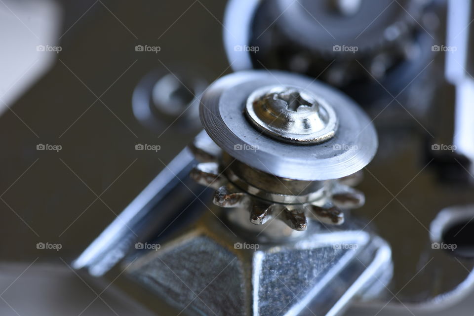 Metal wheel blade of a can opener.