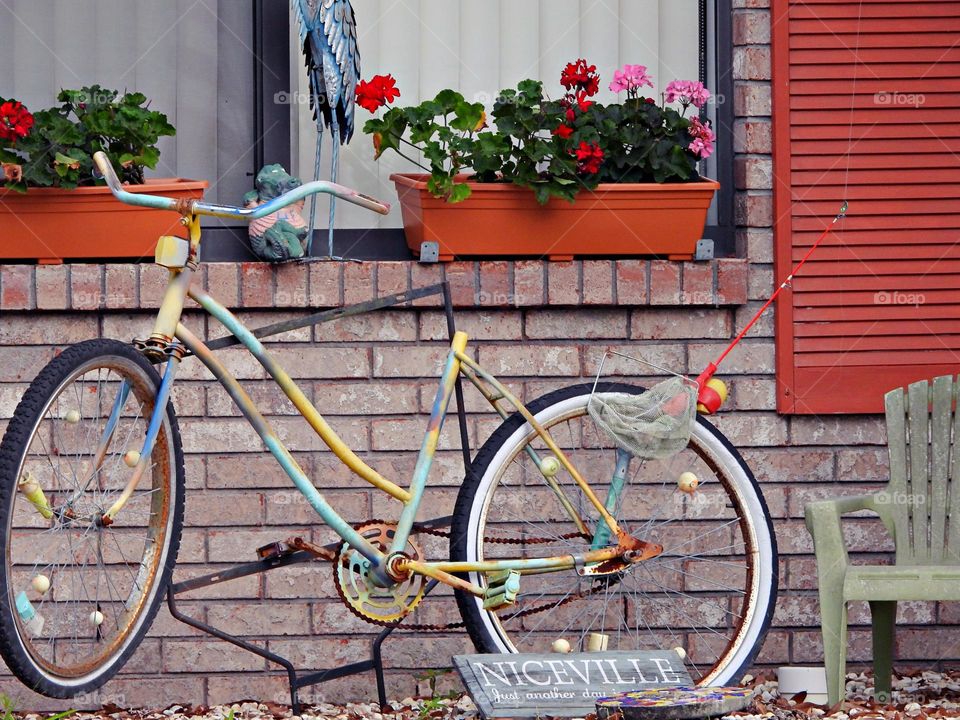 One Lonely Bicycle - There’s just something about a bike decorated with flowers that makes it look right at home. A certain nostalgia we associate with simpler times. 