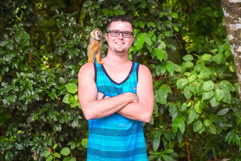 I got the opportunity to pose with a spider monkey