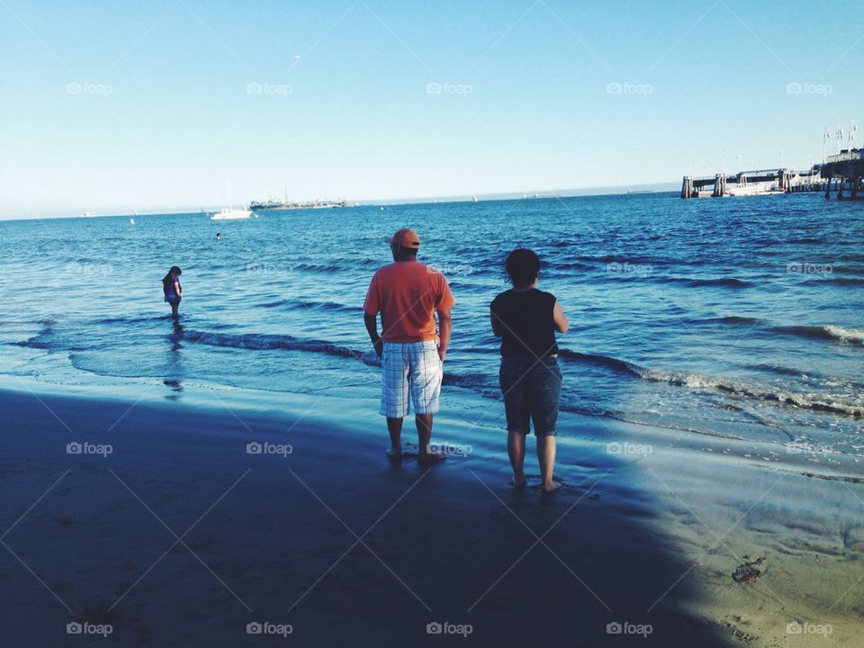 Couple watching the waves