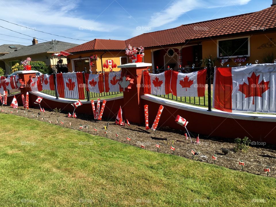 Canadian flag on railing