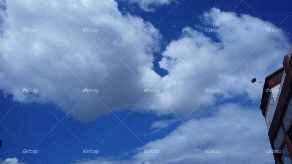 Kissing clouds. A Kiss in the clouds.