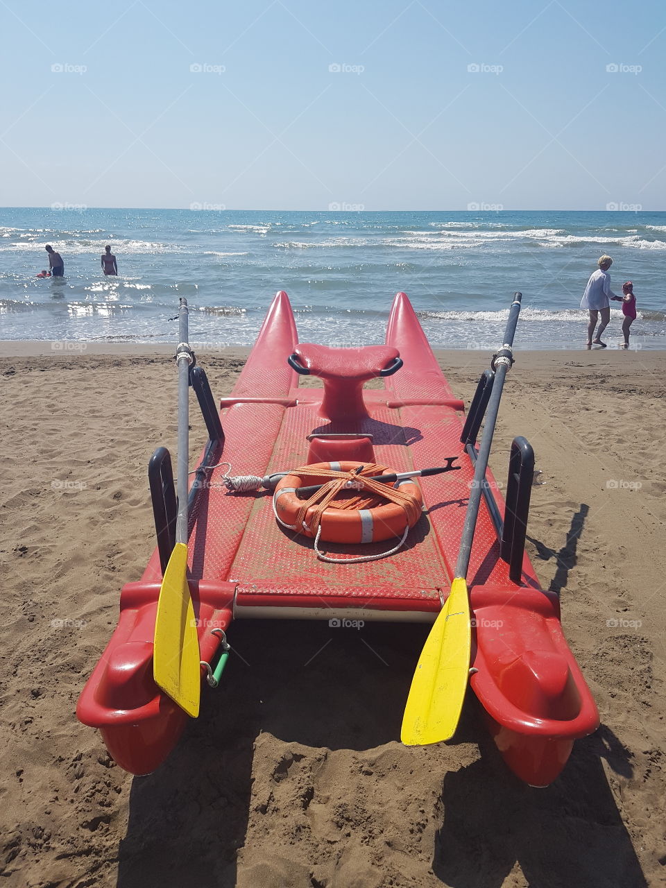 Lifeguard raw boat on the beach in Tuscany