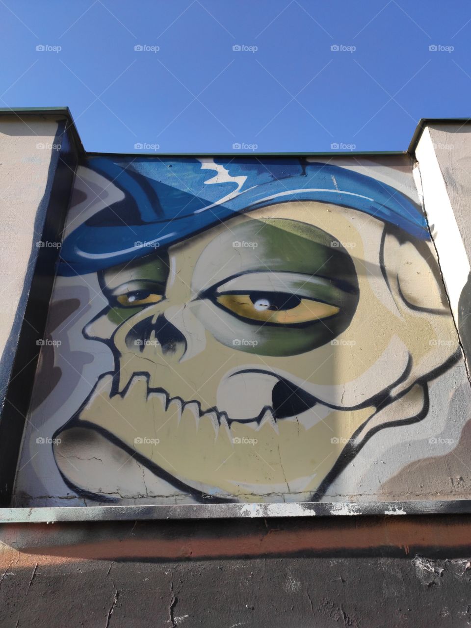 Belgrade Slavia square skull with blue hat