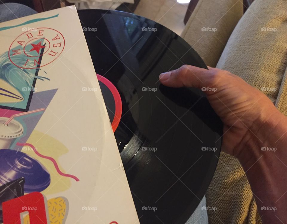Pulling a record from its sleeve