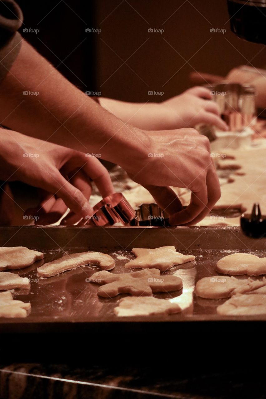Making cut-out cookies in the kitchen.