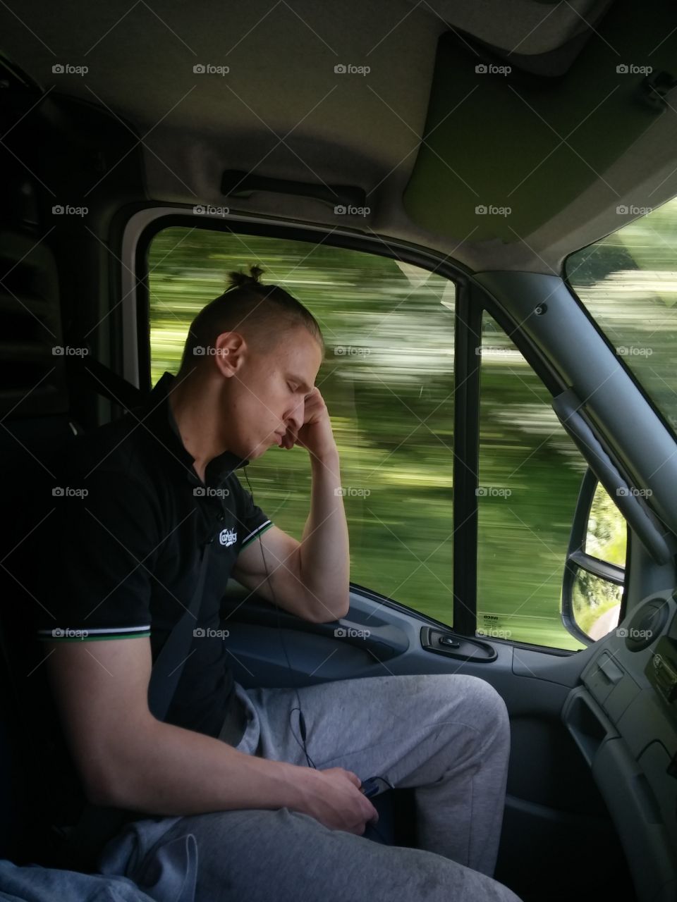 Man resting in car