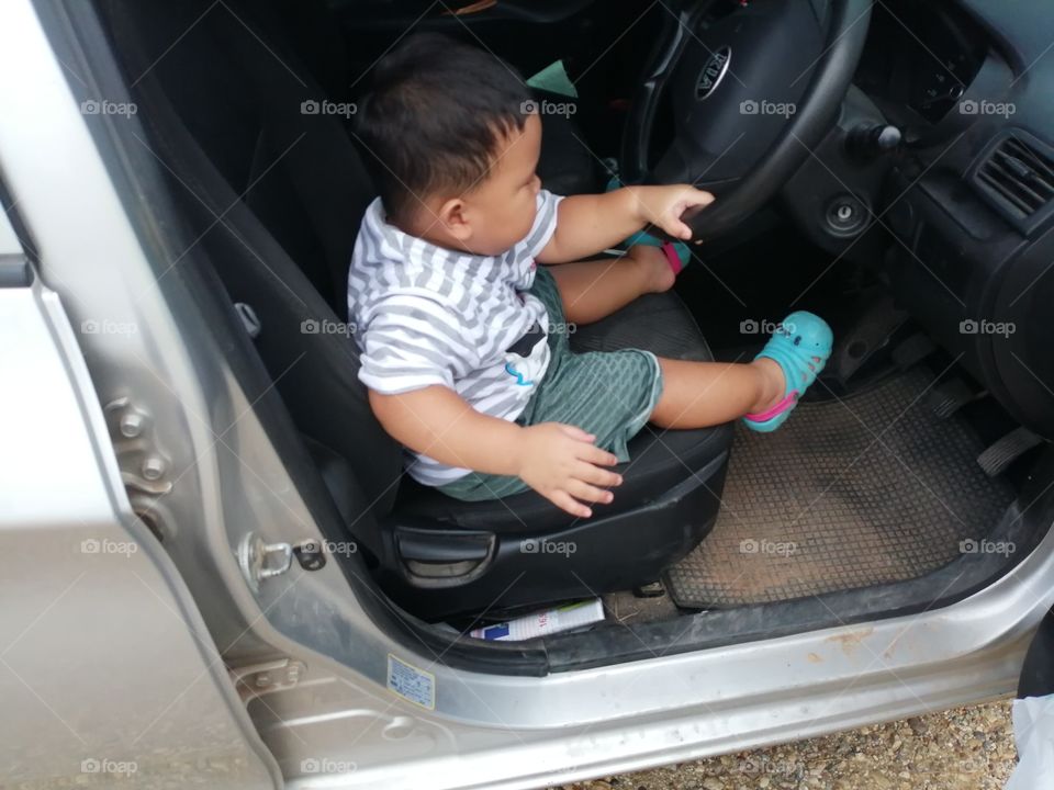 Baby driving lorry