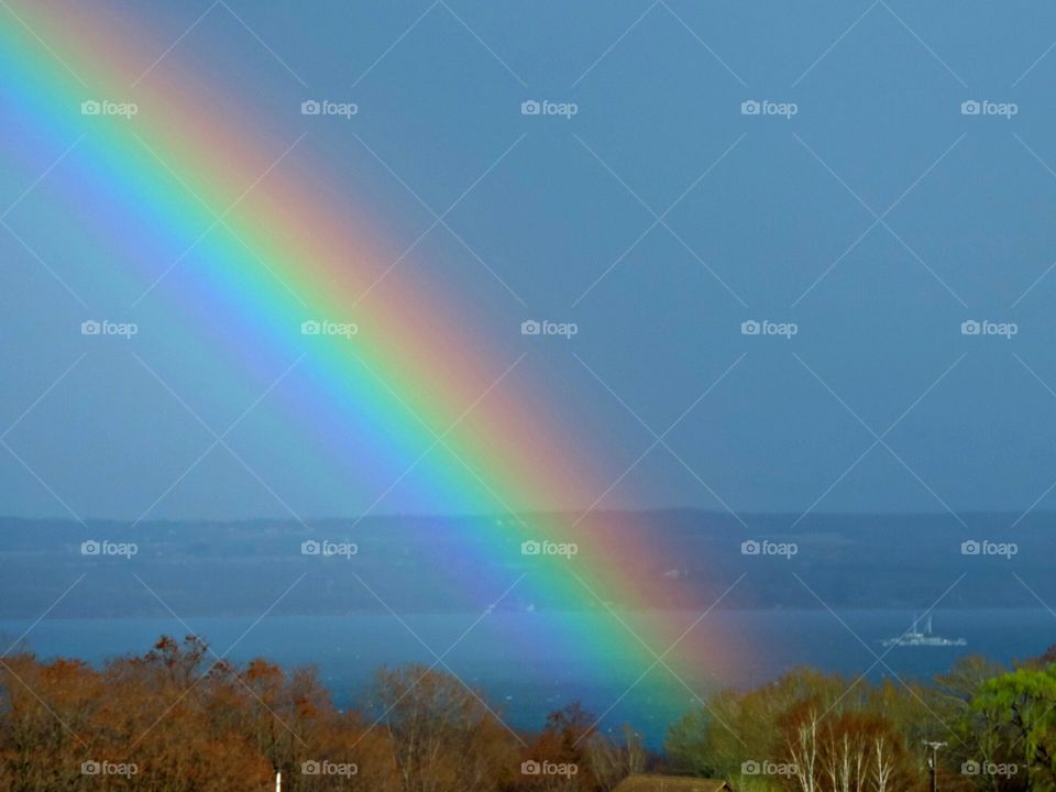 Rainbow in the Lake. Seen from Seneca Lake, NY