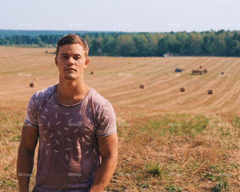 Outdoors man portrait in field