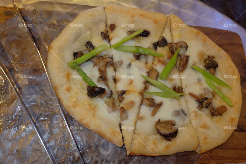 mushroom, truffle, mozzarella and asparagus pizza