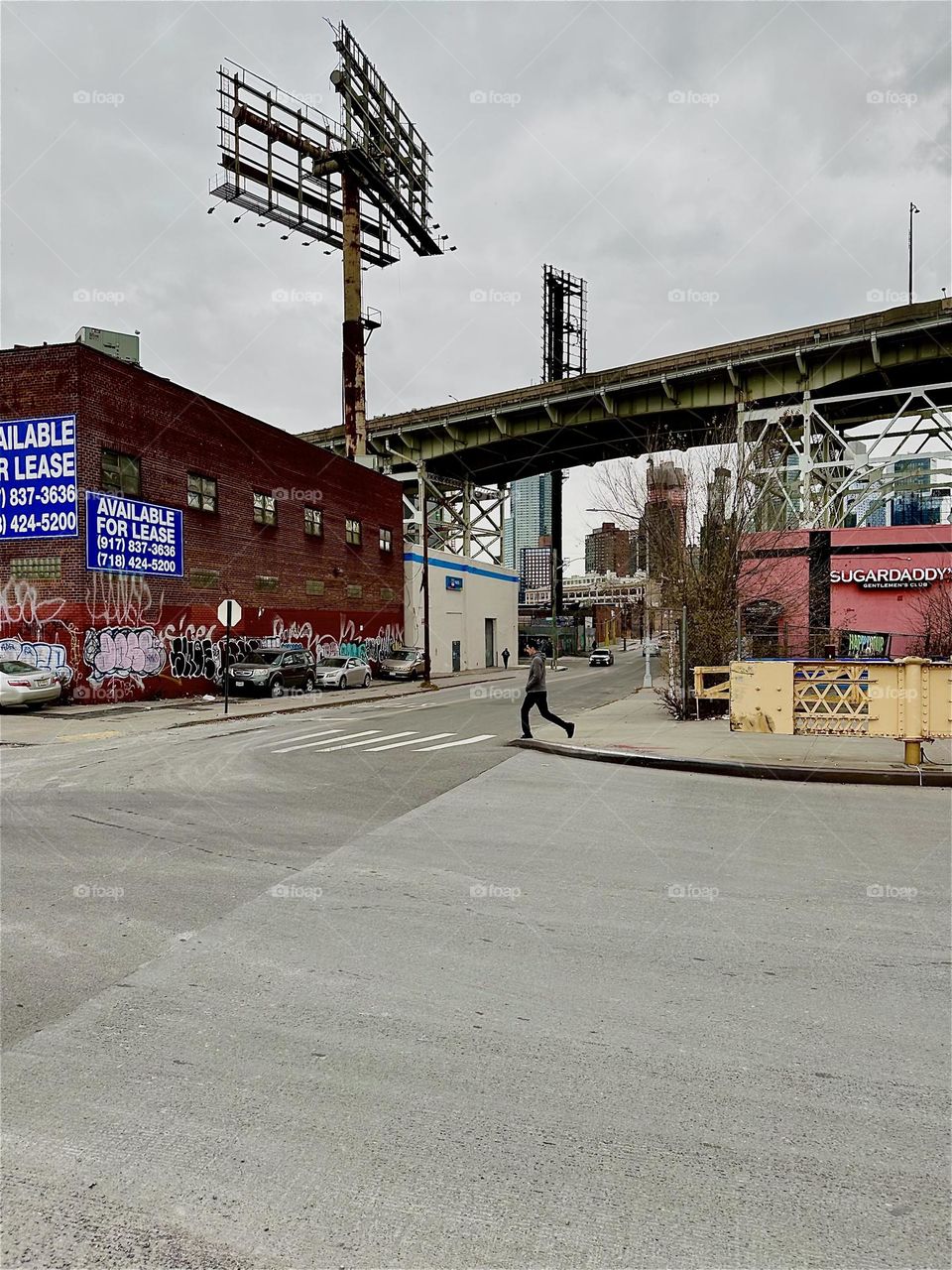 This is “Borden Avenue” and the “Borden Avenue Bridge” over “Dutch Kills”, an ocean inlet of the “East River” in LIC, Queens. The “Brooklyn Queens Expressway” overpass runs parallel and ascends towards the right. 2023. Hypnotic Productions