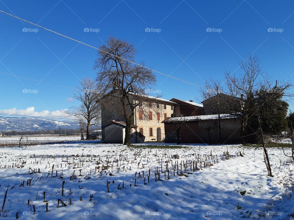 an old house in the snow
