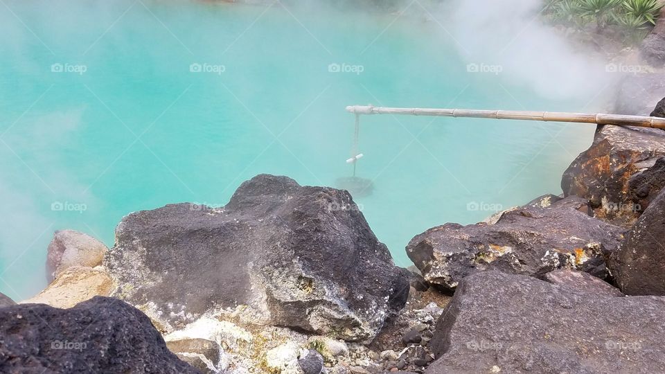 Boiling eggs at the hot spring