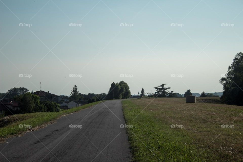 Road  and open area, fields, countryside