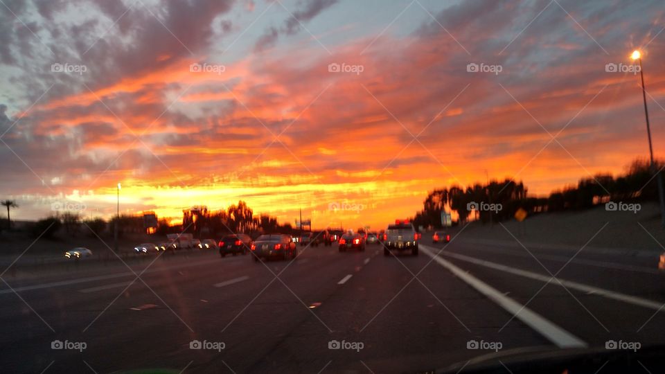 Beautiful Orange Sky . i took this picture driving home it was just so amazing 