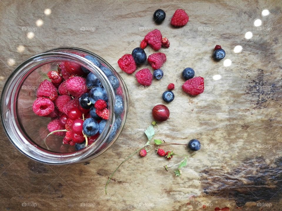 Close-up of berries in glass jar