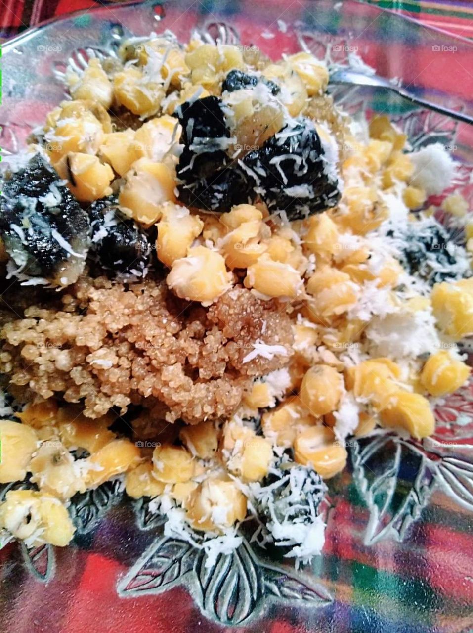 Gatot tiwul, a traditional village food in the city of Yogyakarta, a processed food made from cassava and corn sprinkled with grated coconut. This food is made by steaming until cooked.