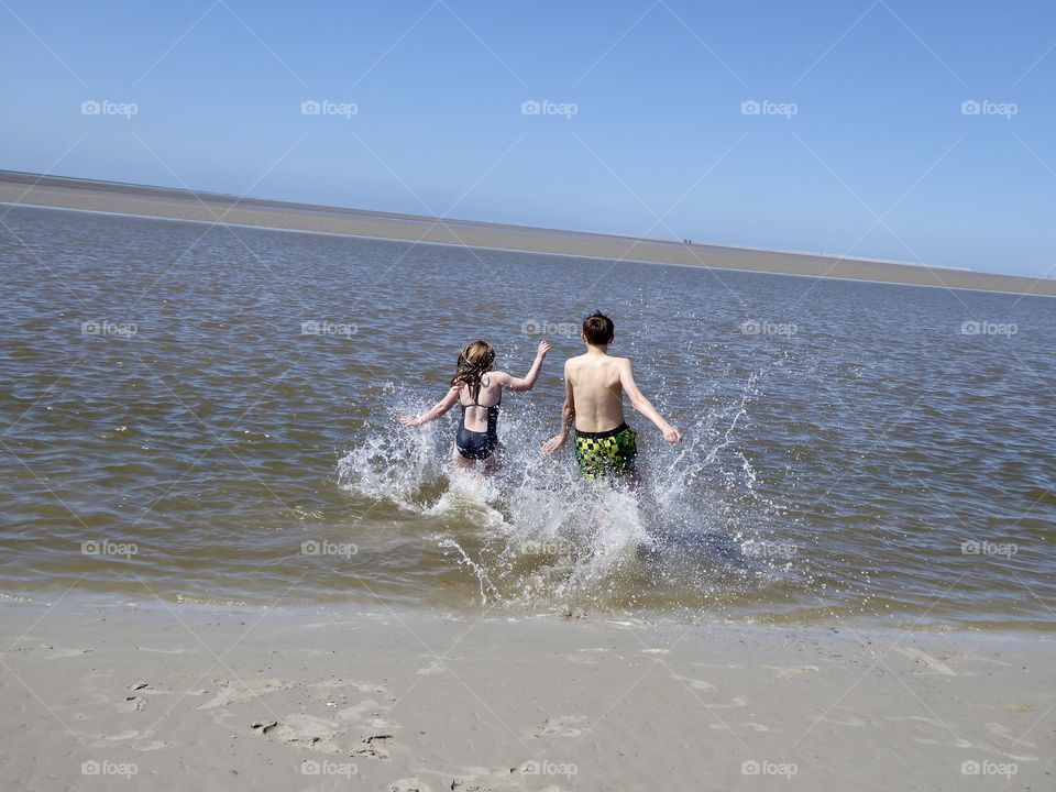 Brother & Sister - run together in the north sea