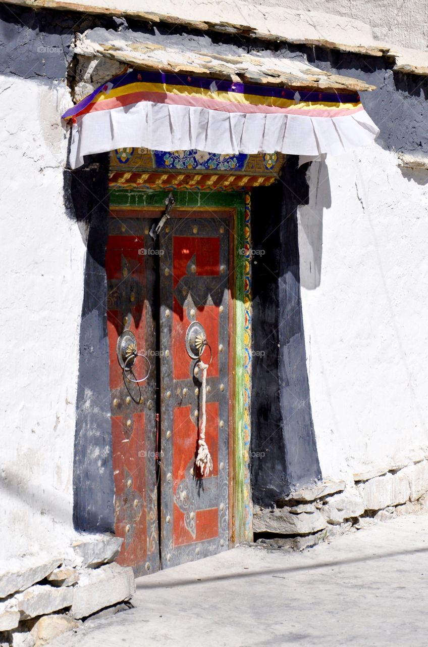 Traditional Tibetan doors in a small Tibetan village - Tingri