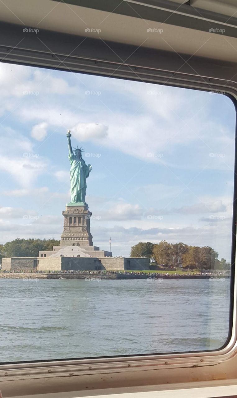 Statue of liberty from the boat cruise New York