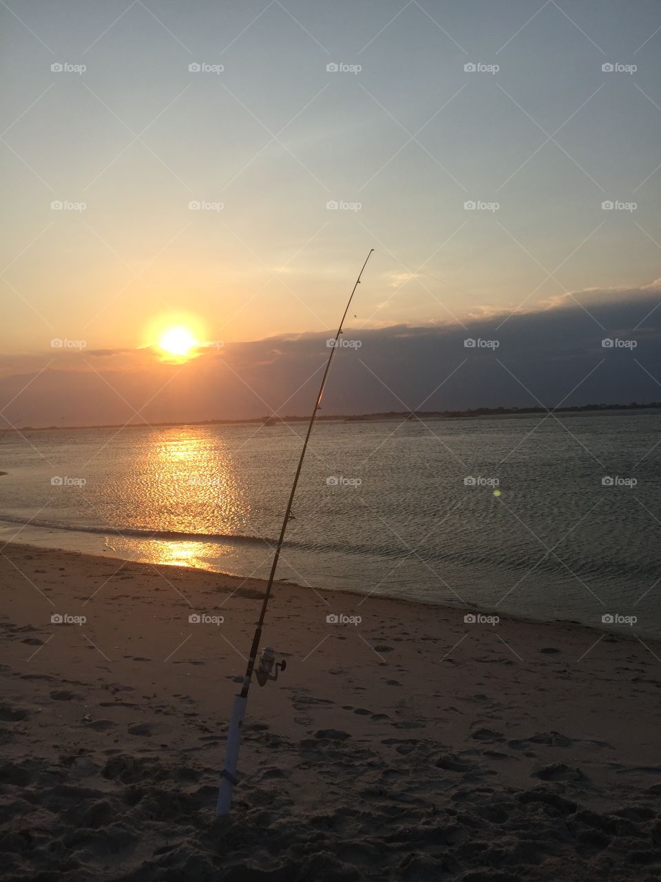 Artistic sunset fishing themed