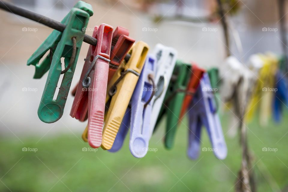 Old clothespins on a rope . close up