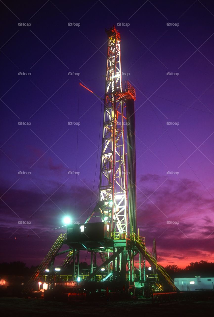 Land drilling rig at twilight