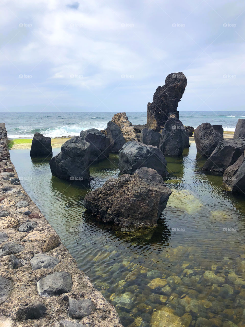 Walking along the tide pool.  Perfect spring day with excellent weather.  These stones stand witness to it all.