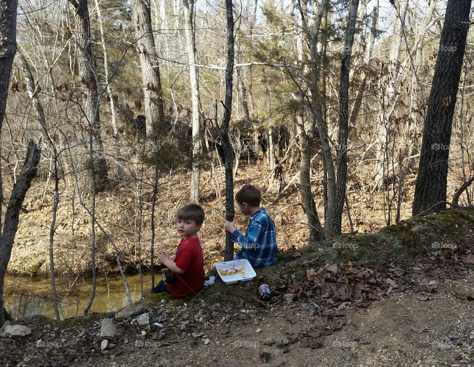 Boys sitting on creek bank @ Hicks
