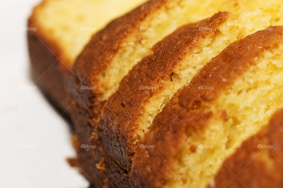 Some delicious homemade orange bread loaves on a plate