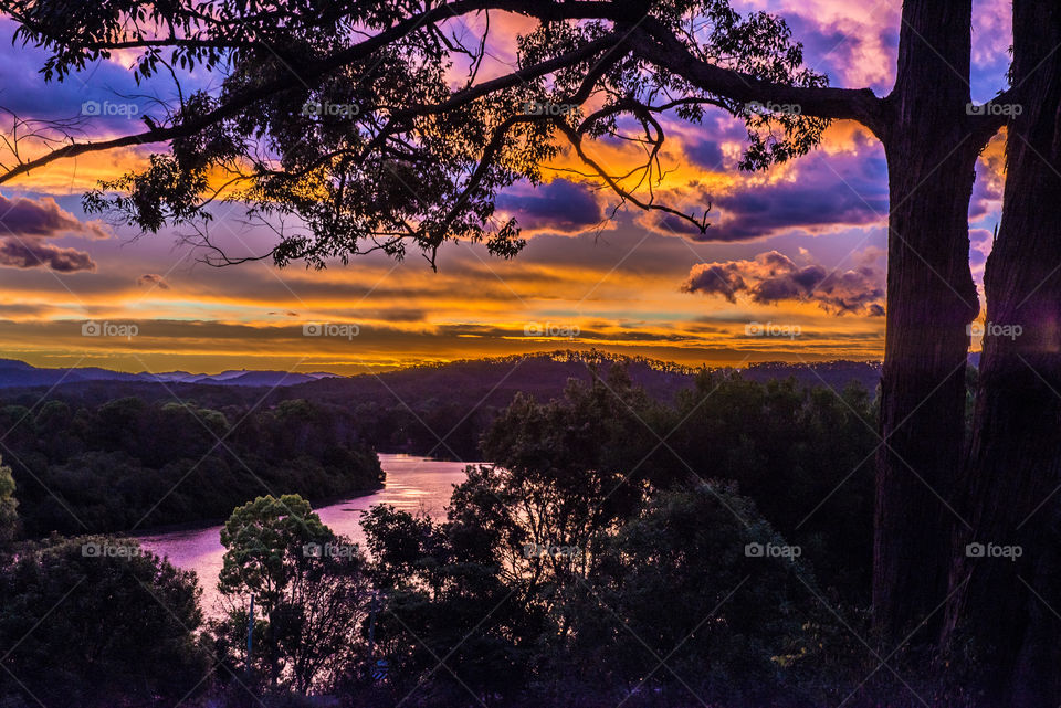 Dramatic sky reflected in stream