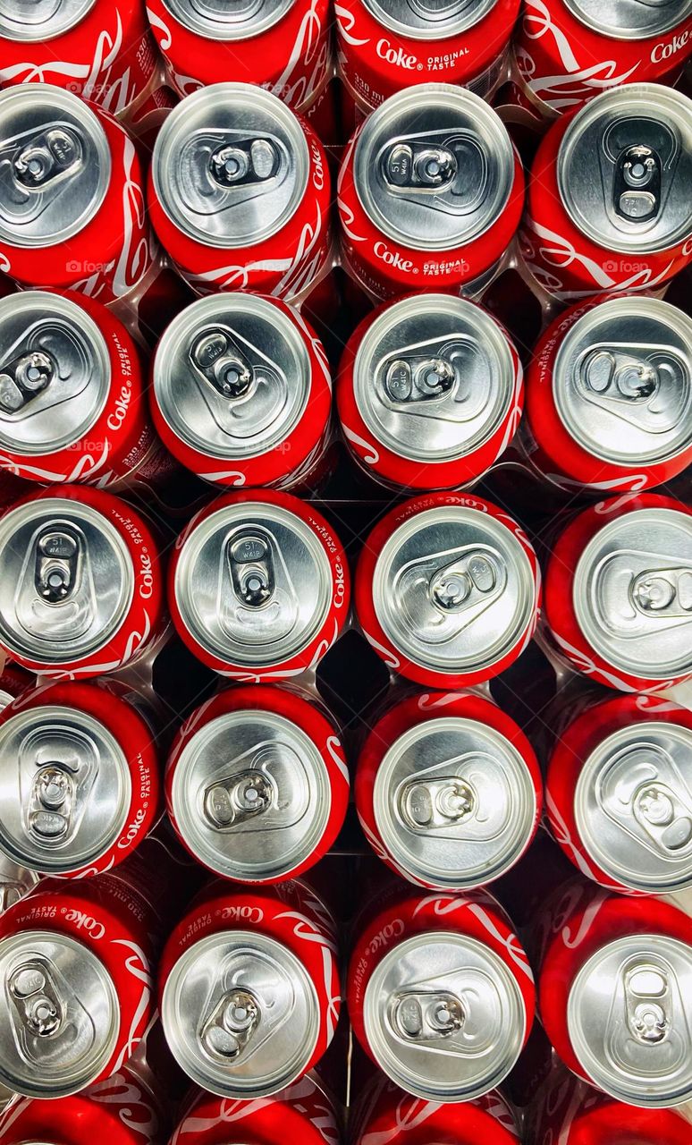 Coca-cola cans pattern.  Can rings.  Silver and red.  multiverse 