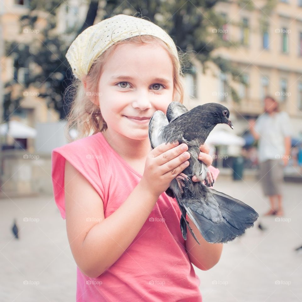 Girl with pigeon