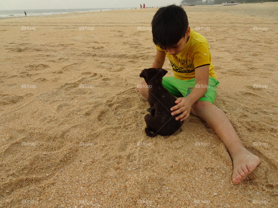 perfect example of unconditional love..a kid and a puppy