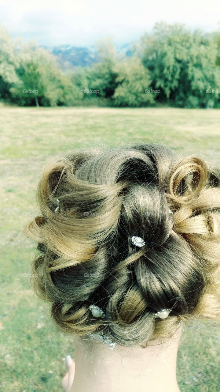Fancy updo for long hair with jewels