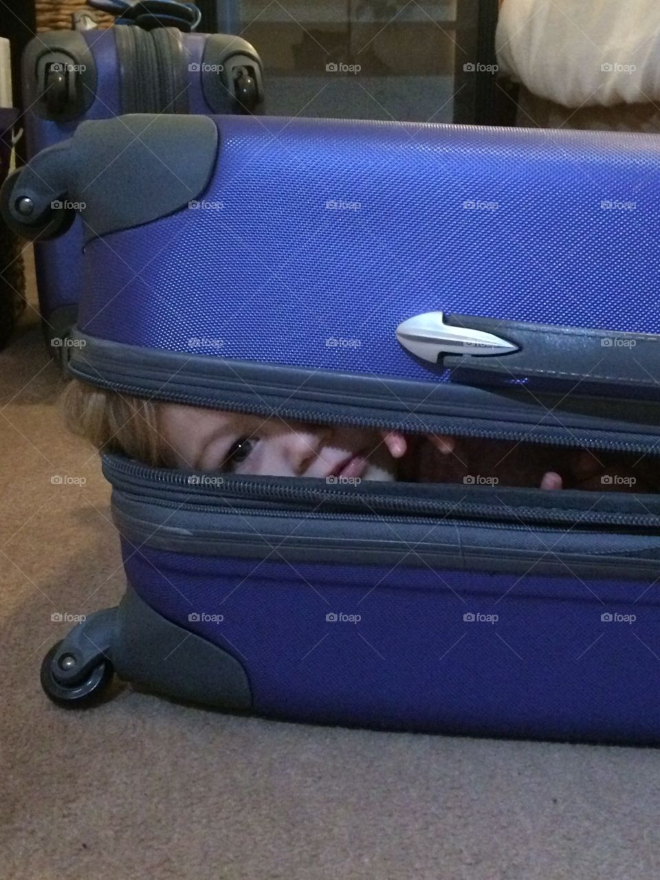 Hiding in Grammy's Suitcase